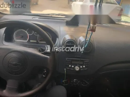 شيفروليه افيو 2012 أسود مستعملة للبيع - 1