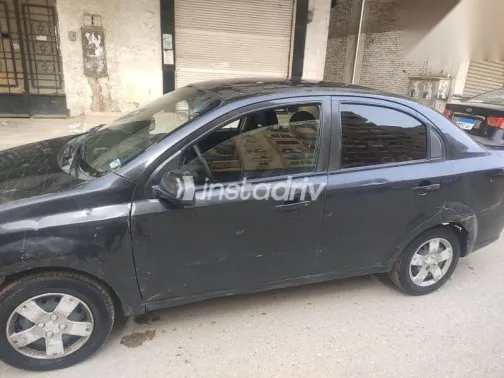 شيفروليه افيو 2012 أسود مستعملة للبيع - 7