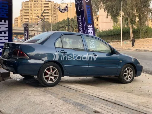 ميتسوبيشي لانسر 2007 أزرق غامق مستعملة للبيع - 2