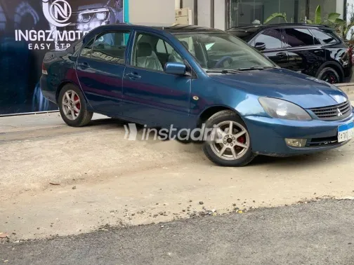 ميتسوبيشي لانسر 2007 أزرق غامق مستعملة للبيع - 5