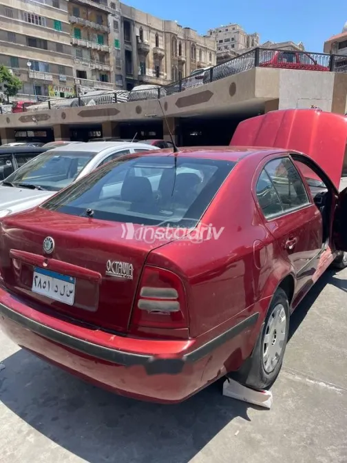 سكودا اوكتافيا A4 2003 أحمر غامق مستعملة للبيع - 2