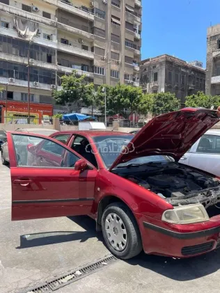سكودا اوكتافيا A4 2003 أحمر غامق مستعملة للبيع