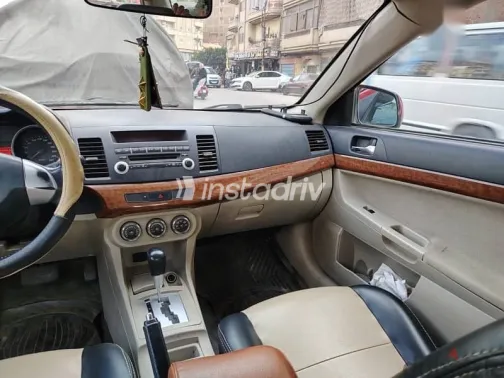 Mitsubishi Lancer 2011 Burgundy Used for Sale - 1