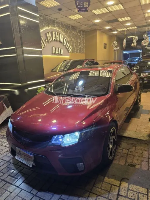 كيا سيراتو كوبيه 2011 أحمر غامق مستعملة للبيع - 3