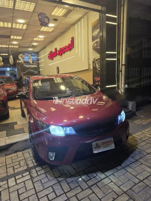 كيا سيراتو كوبيه 2011 أحمر غامق مستعملة للبيع - 4