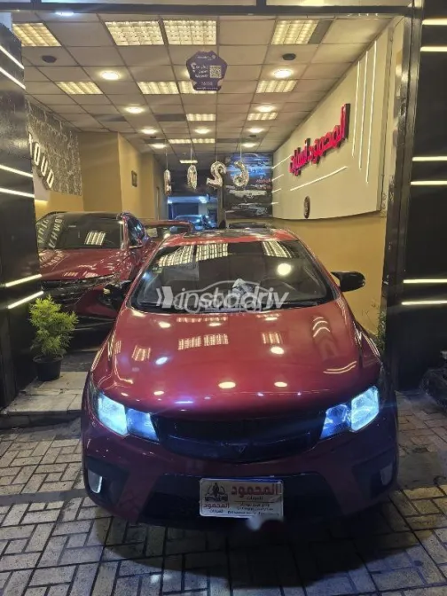 كيا سيراتو كوبيه 2011 أحمر غامق مستعملة للبيع - 5