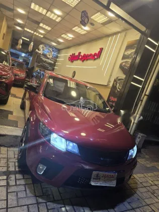 كيا سيراتو كوبيه 2011 أحمر غامق مستعملة للبيع