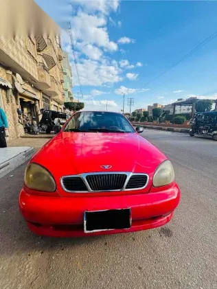 دايو لانوس 1999 أحمر مستعملة للبيع