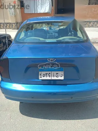 دايو لانوس 2004 أزرق غامق مستعملة للبيع