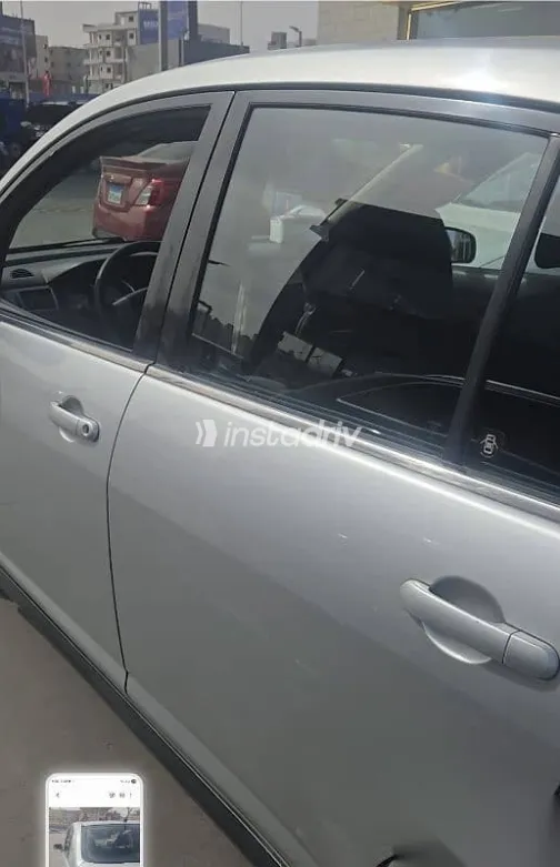 نيسان تيدا 2009 فضي مستعملة للبيع - 4