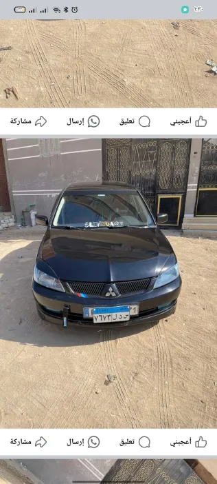 ميتسوبيشي لانسر بومة 2006 أبيض مستعملة للبيع