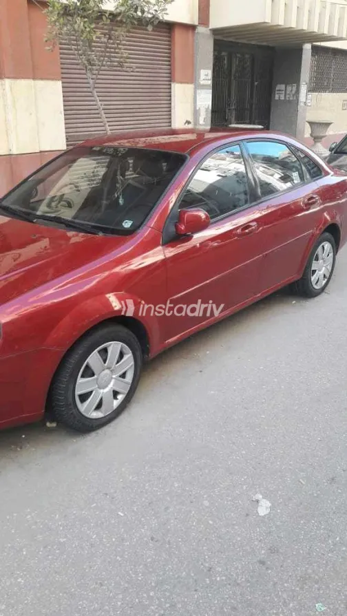 شيفروليه أوبترا 2013 أبيض مستعملة للبيع - 4