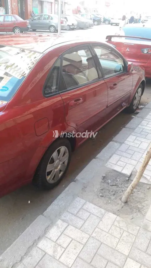 شيفروليه أوبترا 2013 أبيض مستعملة للبيع - 5