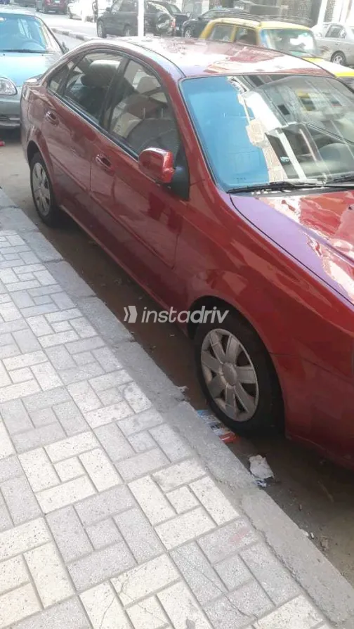 شيفروليه أوبترا 2013 أبيض مستعملة للبيع - 7