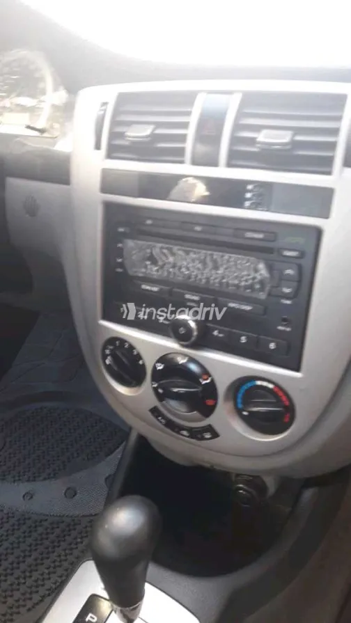 شيفروليه أوبترا 2013 أبيض مستعملة للبيع - 8