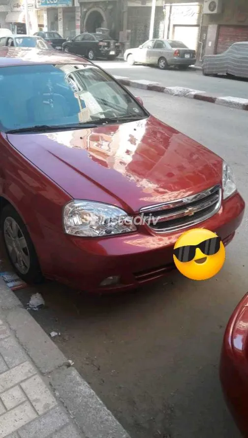 شيفروليه أوبترا 2013 أبيض مستعملة للبيع - 9