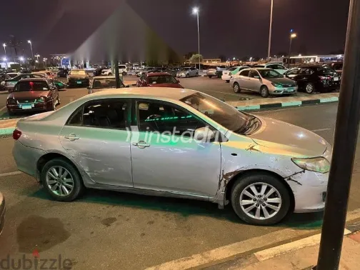 تويوتا كورولا 2008 فضي مستعملة للبيع - 7