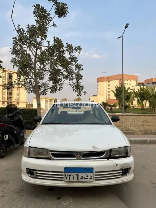 ميتسوبيشي لانسر 1992 أبيض مستعملة للبيع - 2