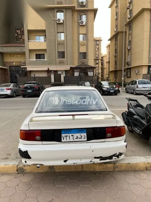 ميتسوبيشي لانسر 1992 أبيض مستعملة للبيع - 3