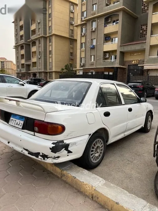 ميتسوبيشي لانسر 1992 أبيض مستعملة للبيع - 4