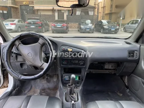 ميتسوبيشي لانسر 1992 أبيض مستعملة للبيع - 5