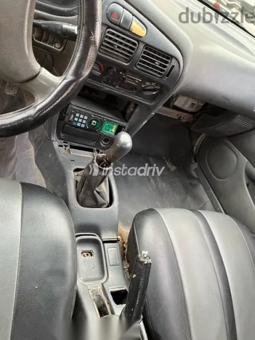 ميتسوبيشي لانسر 1992 أبيض مستعملة للبيع - 6