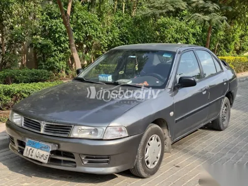 ميتسوبيشي لانسر 1997 فضي مستعملة للبيع - 2