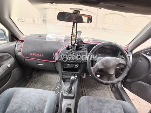 ميتسوبيشي لانسر 1997 فضي مستعملة للبيع - 6