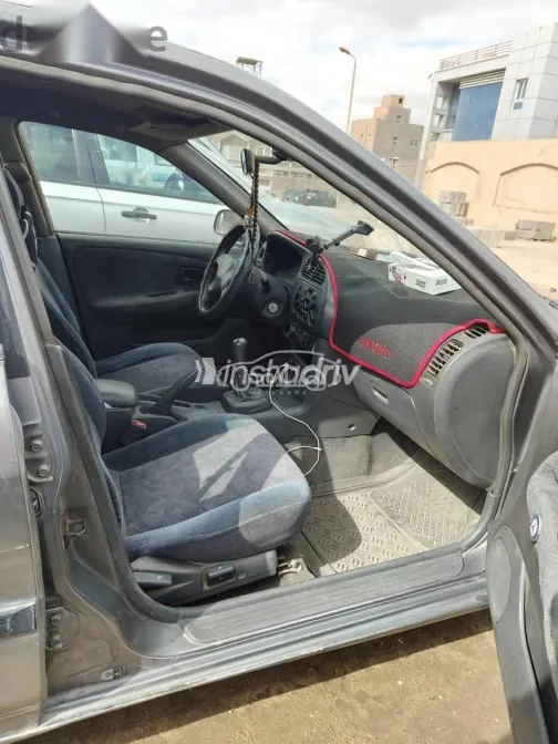 ميتسوبيشي لانسر 1997 فضي مستعملة للبيع - 8