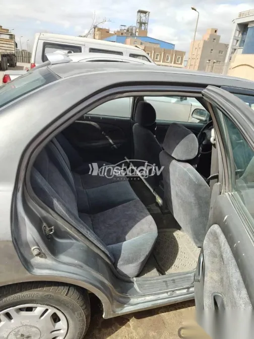 ميتسوبيشي لانسر 1997 فضي مستعملة للبيع - 9