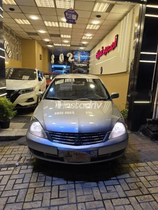 ميتسوبيشي لانسر 2011 فضي مستعملة للبيع - 2