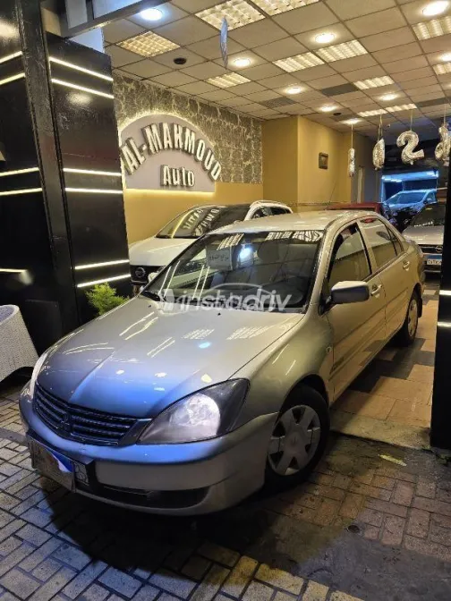 ميتسوبيشي لانسر 2011 فضي مستعملة للبيع - 3