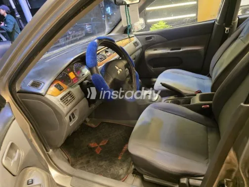 ميتسوبيشي لانسر 2011 فضي مستعملة للبيع - 5