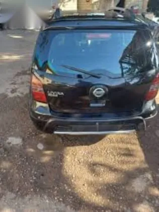 نيسان ليفينا 2010 أسود مستعملة للبيع