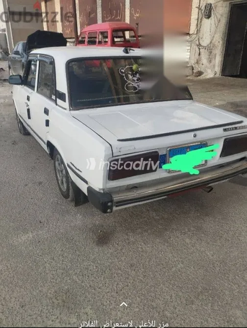 لادا 2107 2009 أبيض مستعملة للبيع - 1