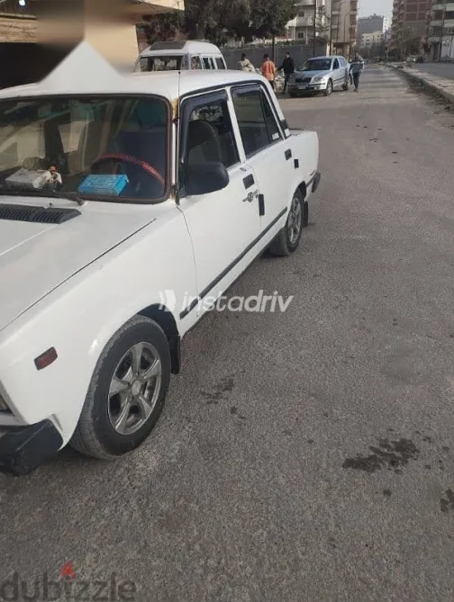 لادا 2107 2009 أبيض مستعملة للبيع - 3