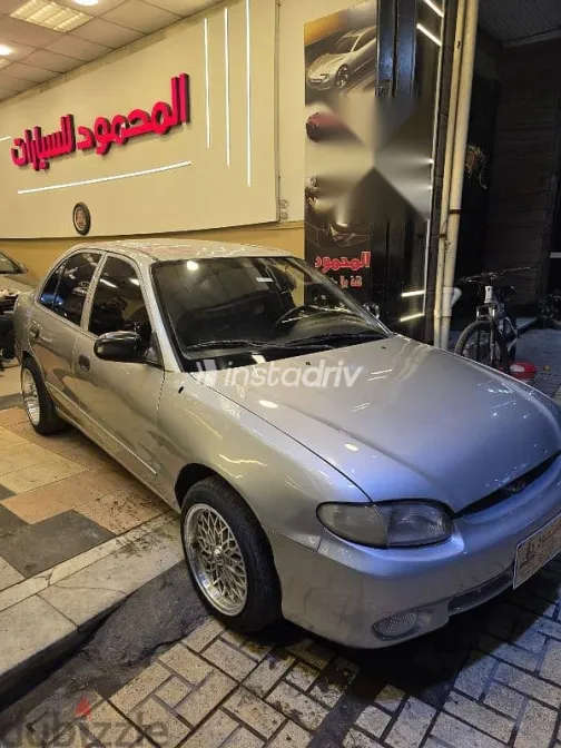 هيونداي اكسنت 2001 فضي مستعملة للبيع - 10