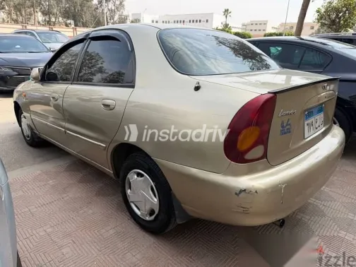 دايو لانوس 2001 ذهبي مستعملة للبيع - 2