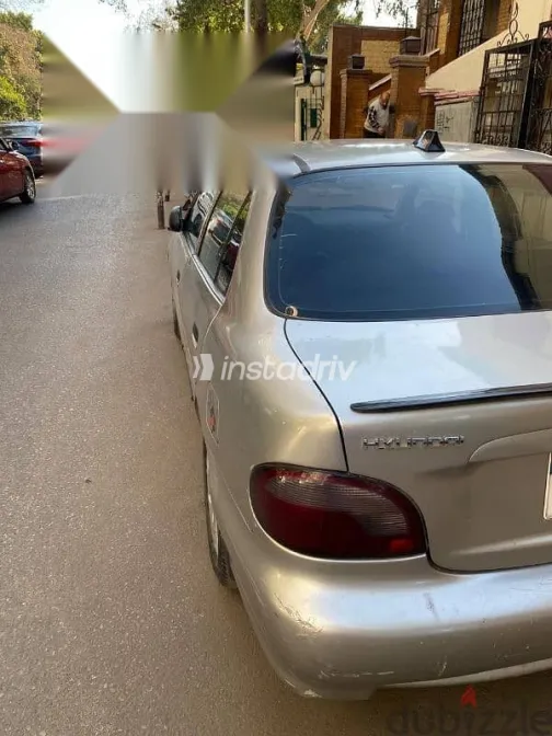 هيونداي اكسنت 2006 فضي مستعملة للبيع - 2