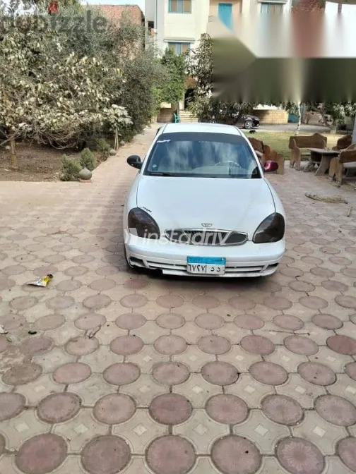 دايو نوبيرا 2003 أبيض مستعملة للبيع - 3