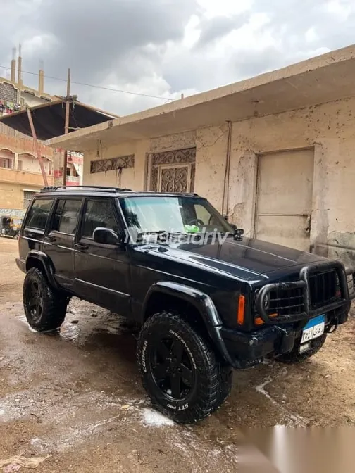 جيب شيروكي 1999 أزرق غامق مستعملة للبيع - 4