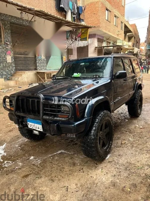 جيب شيروكي 1999 أزرق غامق مستعملة للبيع - 5