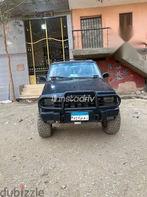جيب شيروكي 1999 أزرق غامق مستعملة للبيع - 8