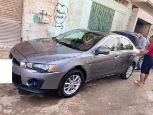 ميتسوبيشي لانسر اى اكس شارك 2016 رمادي مستعملة للبيع