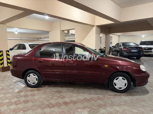 شيفروليه لانوس 2014 أحمر غامق مستعملة للبيع - 4