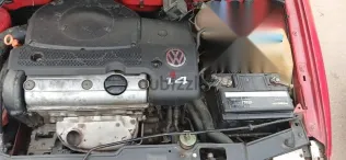 فولكس فاغن بولو 1998 أحمر مستعملة للبيع