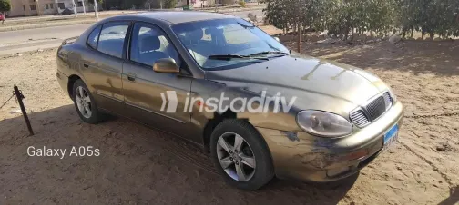 دايو ليوجانزا 1999 ذهبي مستعملة للبيع - 1