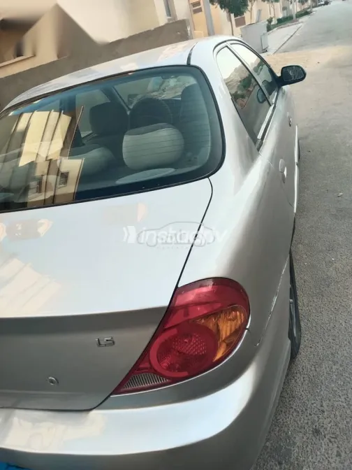 كيا سبكترا 2003 فضي مستعملة للبيع - 7