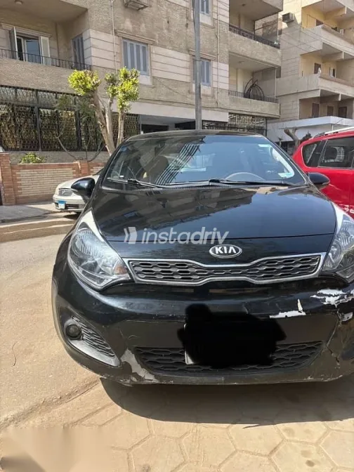 كيا ريو 2013 أسود مستعملة للبيع - 1