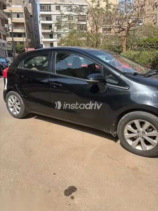 كيا ريو 2013 أسود مستعملة للبيع - 7